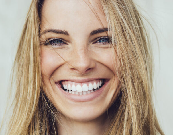 Portrait of young woman with beautiful smile